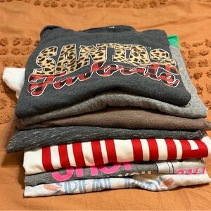 Seven women’s holiday shirts, large/XL